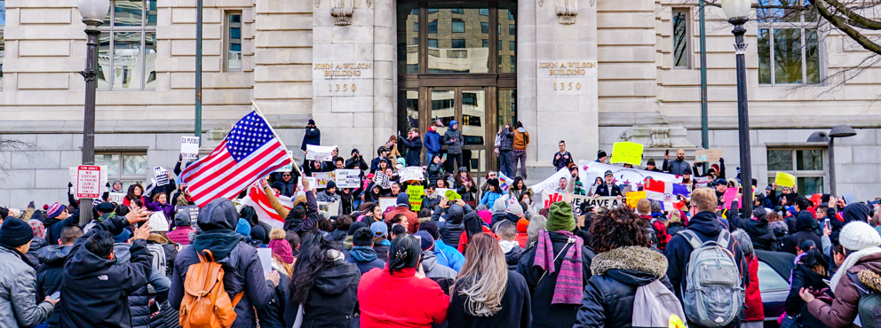 A group of protestors outside a government building